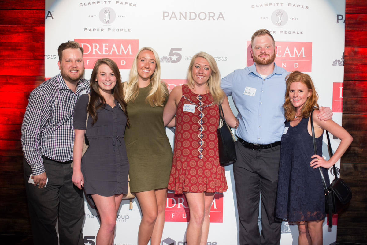 dallas event photostation photo station, 6 people side by side in front of backdrop.